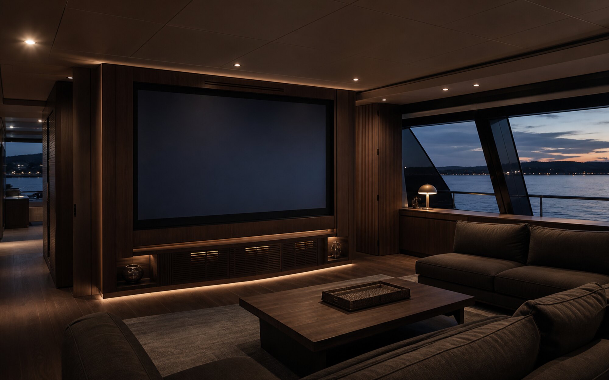 Conceptual yacht salon cinema with a dark display, fixed seating and glazing to the sea